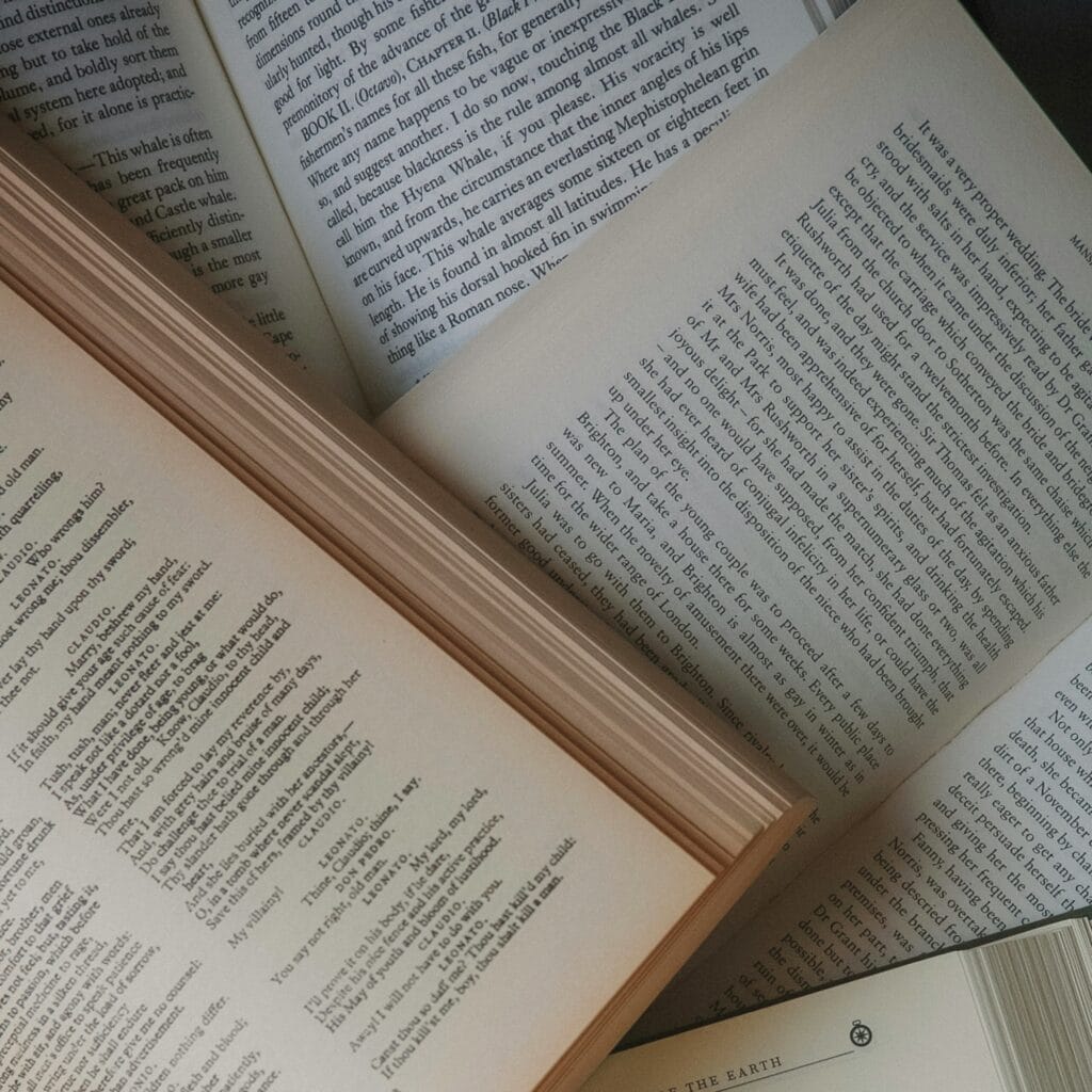 Stack of open books for IB study habits article