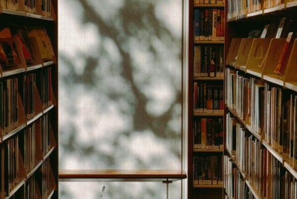 library aisle with bookshelves